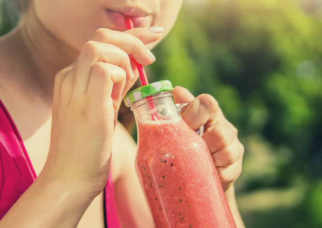 picture of woman drinking placenta smoothie