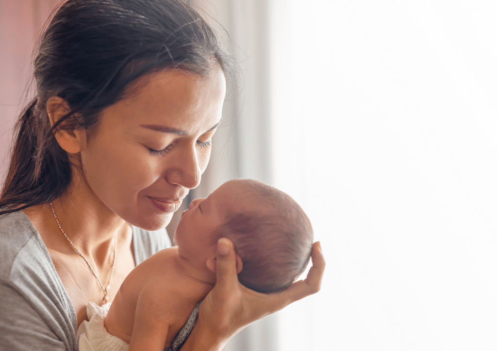 picture of mother holding newborn does vegan pregnancy cause autism