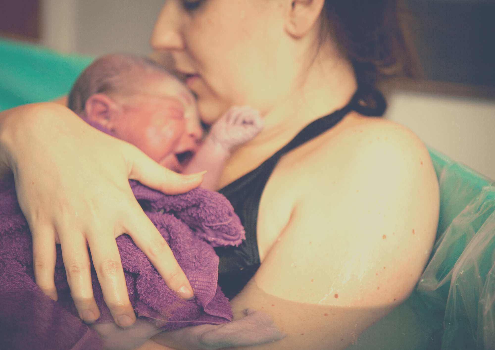 photo of a mother and baby in water birth pool after childbirth HBAC home birth after c section